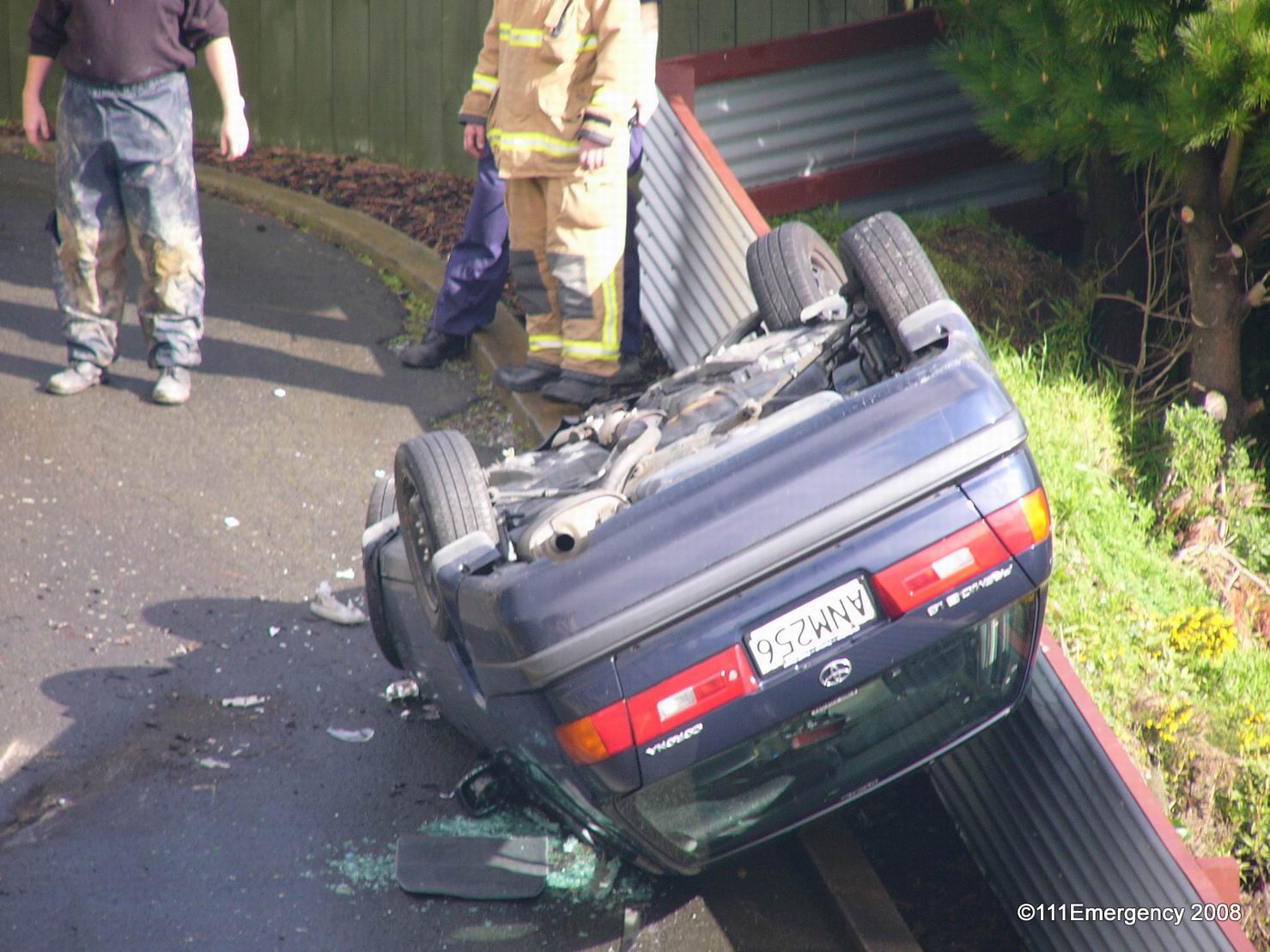 ACCIDENT SCENES 71 Car rolled down bank Woodman Dr, Tawa